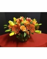 Lilies, roses and gerber daisies flower arrangement