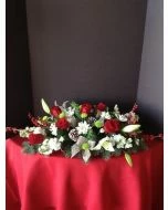 Christmas centerpiece, flowers for Christmas decor, roses, lilies, christmas greens