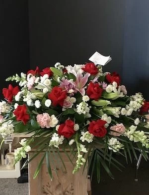 Warm Hearts Casket Spray