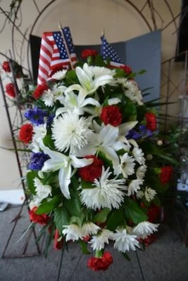 Patriotic Funeral FLowers with Flags