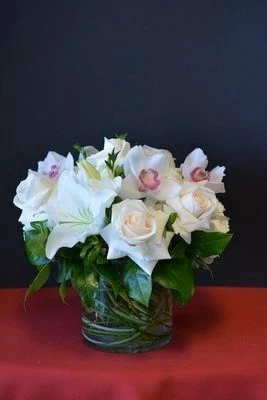 all white flower arrangement, white roses, white orchids, white lilies,low arrangement, centerpiece