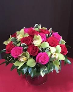 Elegant Vibrance of Orchids and Roses