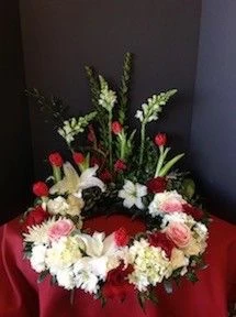 Funeral Flowers Urn Wreath with Red Tulips