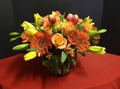 Lilies, roses and gerber daisies flower arrangement
