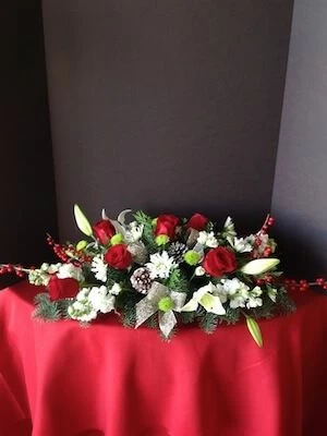 Christmas centerpiece, flowers for Christmas decor, roses, lilies, christmas greens