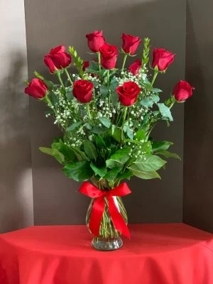 1 Dozen red roses with babies breath
